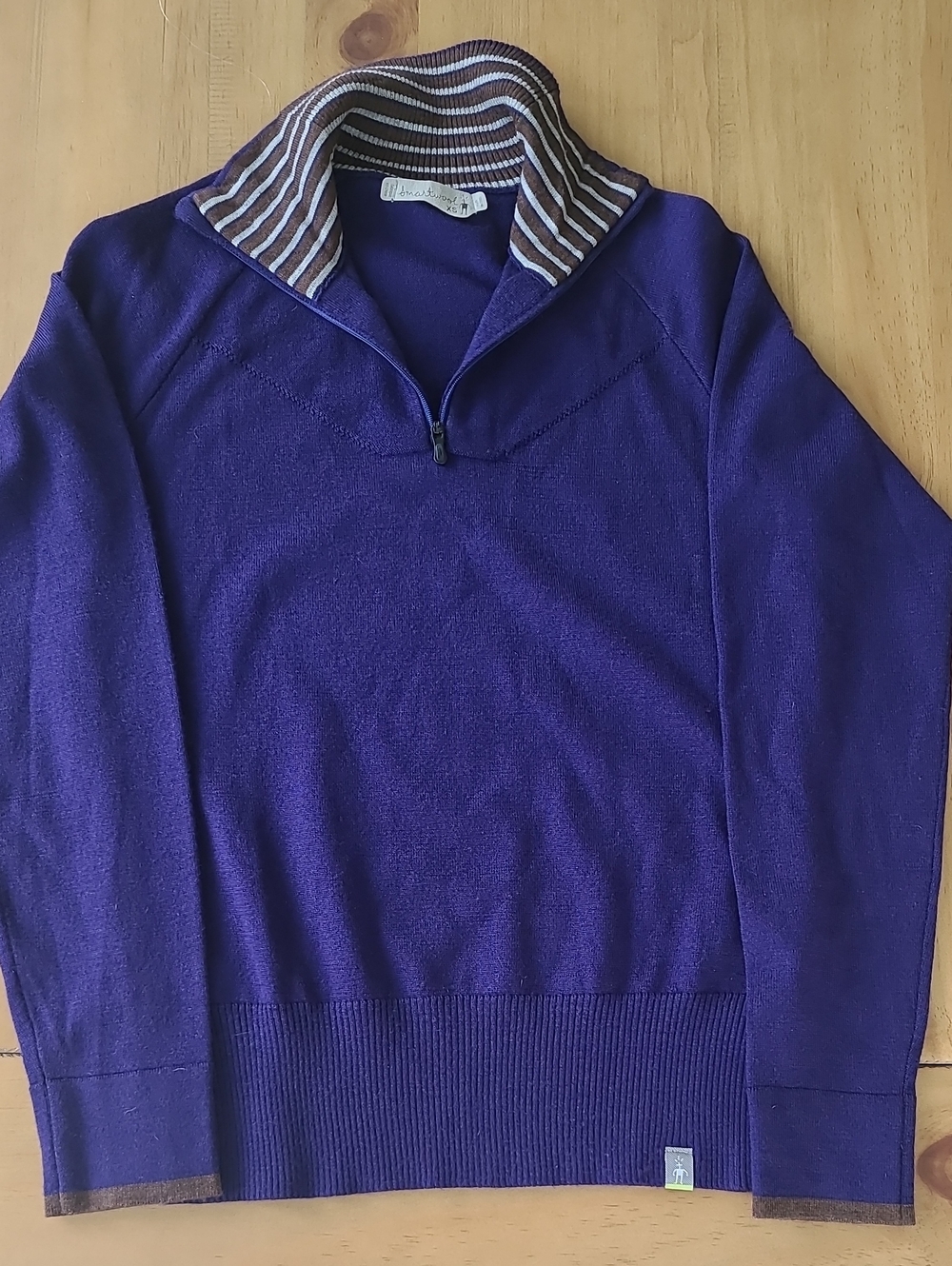 Smartwool Purple Half-Zip Sweater with Brown-Striped Collar and Accent On Cuff.